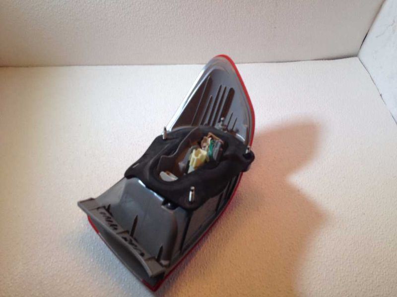 Left taillamp assembly outer used genuine OEM Toyota Corolla 2011-2013