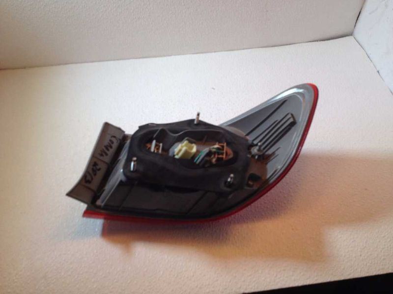 Left taillamp assembly outer used genuine OEM Toyota Corolla 2011-2013