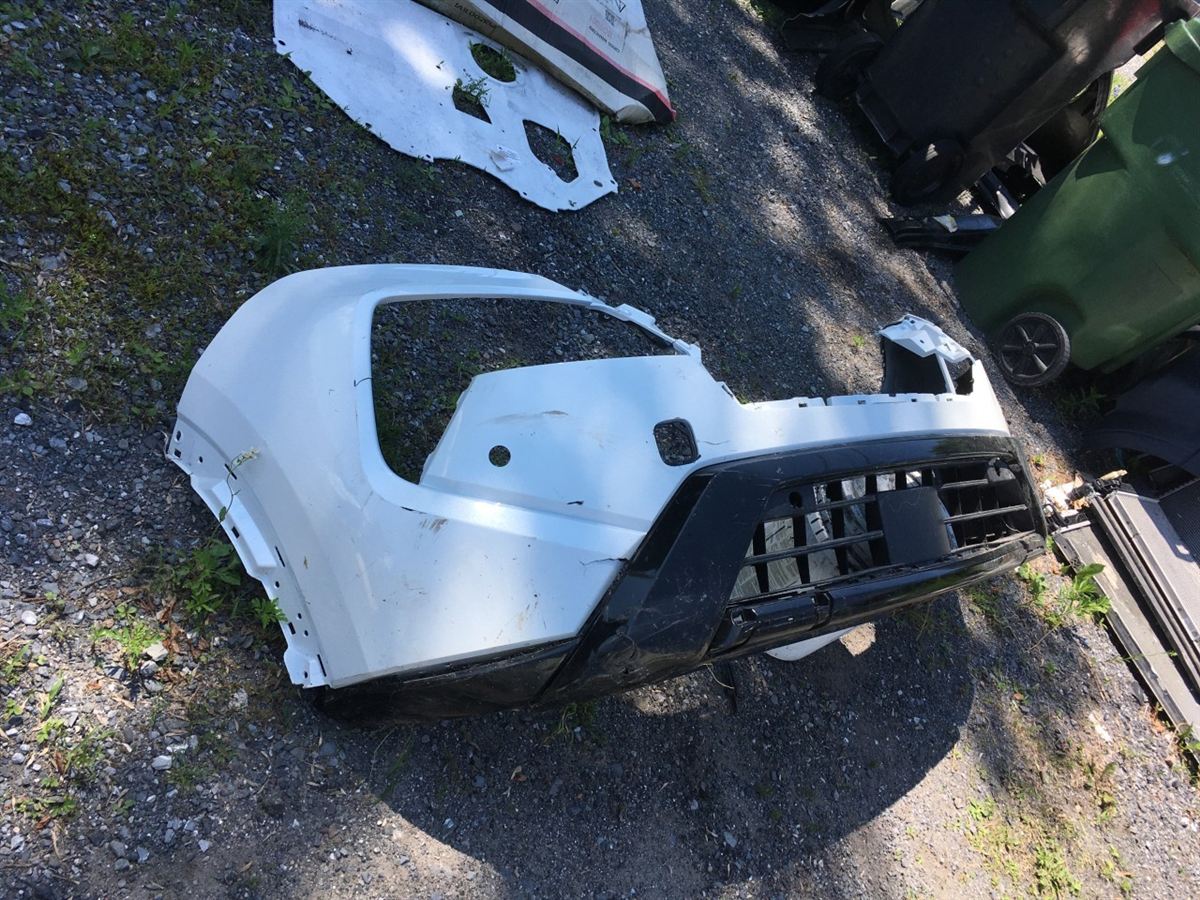 Left front bumper insert used genuine OEM Nissan Rogue 2024-2025