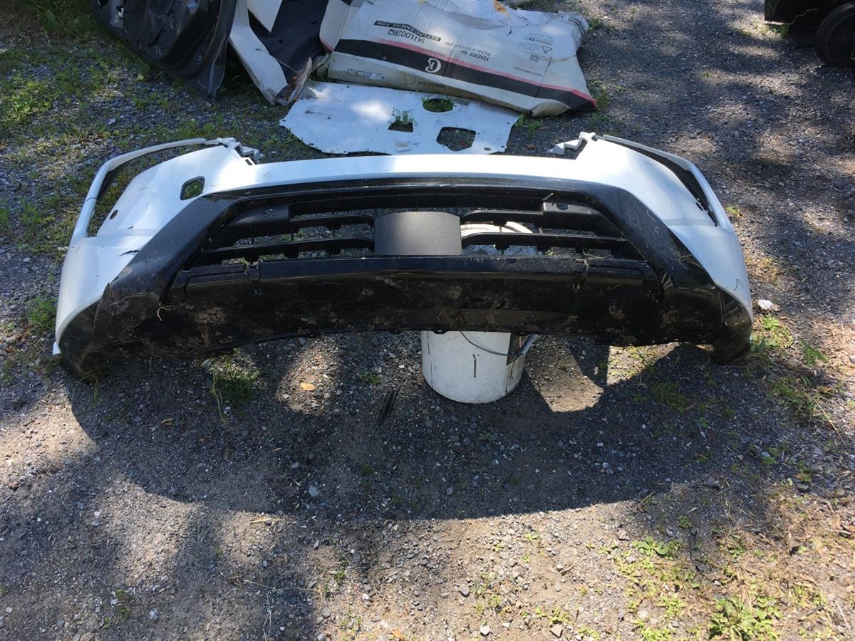 Left front bumper insert used genuine OEM Nissan Rogue 2024-2025