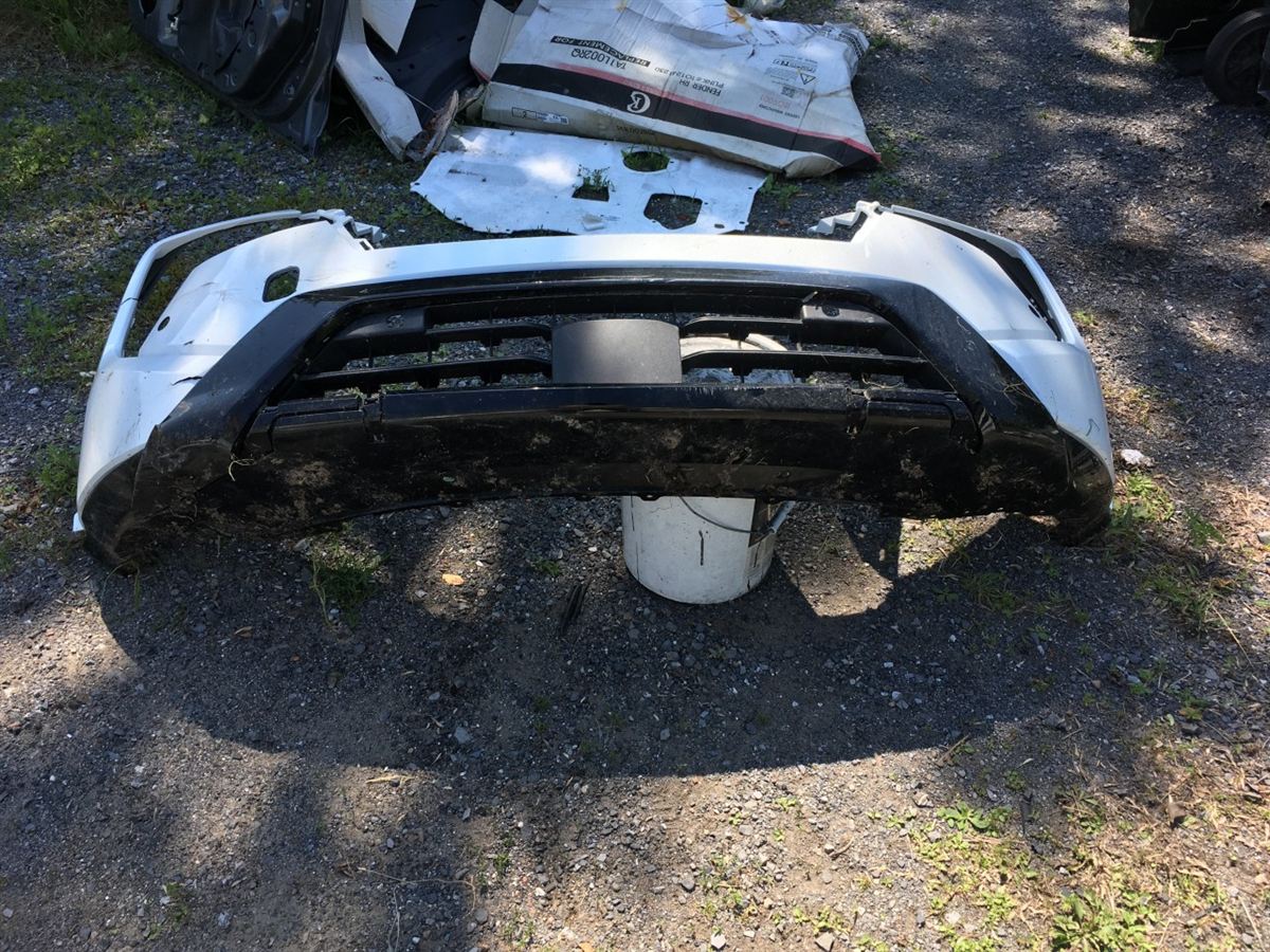 Left front bumper insert used genuine OEM Nissan Rogue 2024-2025