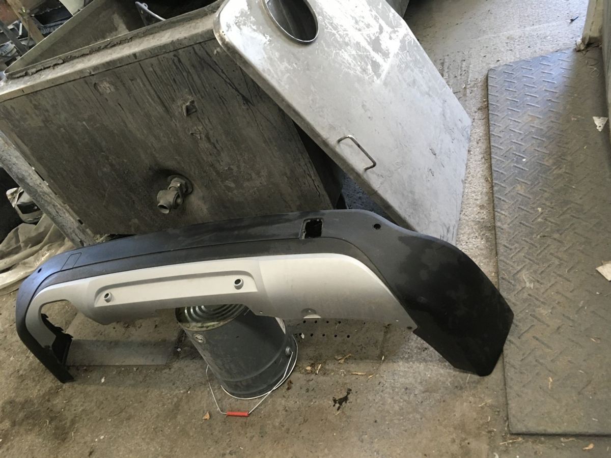 Defensa (parachoques) trasera usada original (OEM) BMW X1 2013-2015