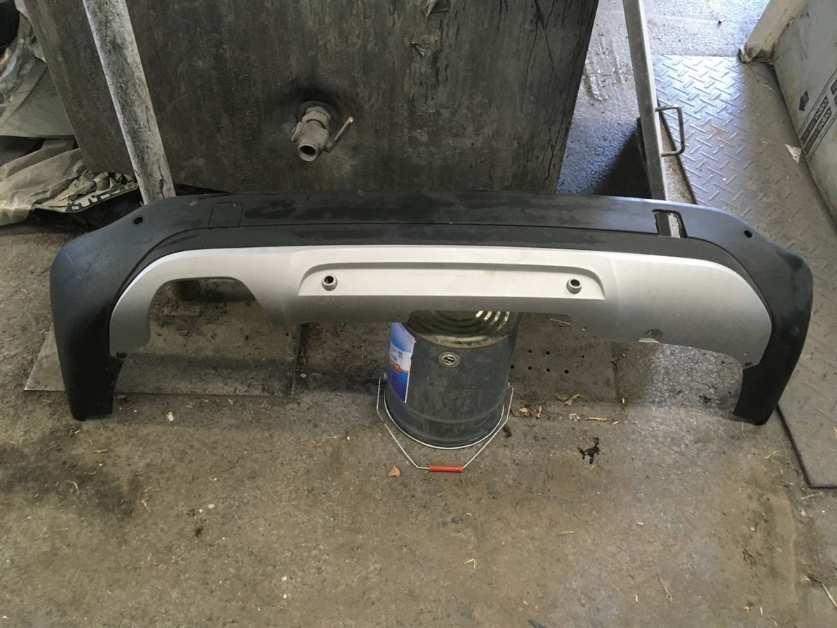 Defensa (parachoques) trasera usada original (OEM) BMW X1 2013-2015