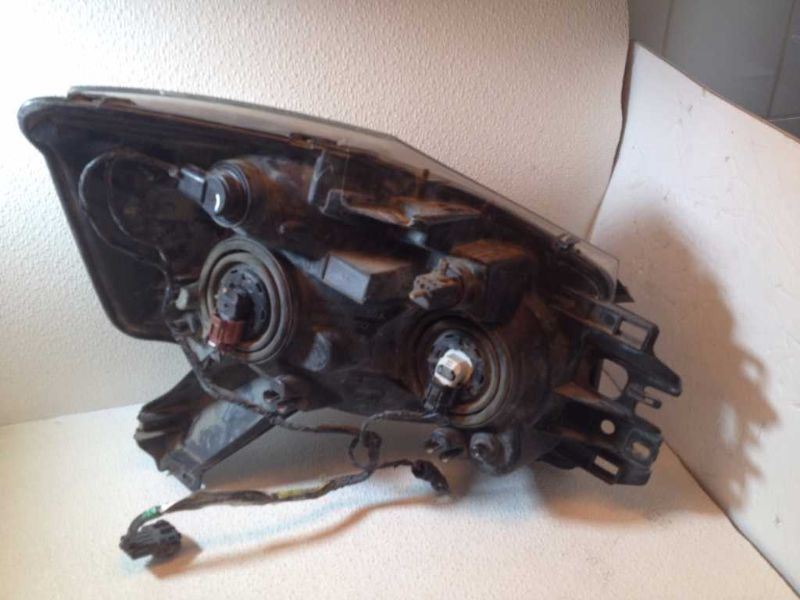 Left headlamp assembly composite used genuine OEM Nissan Armada 2005-2007