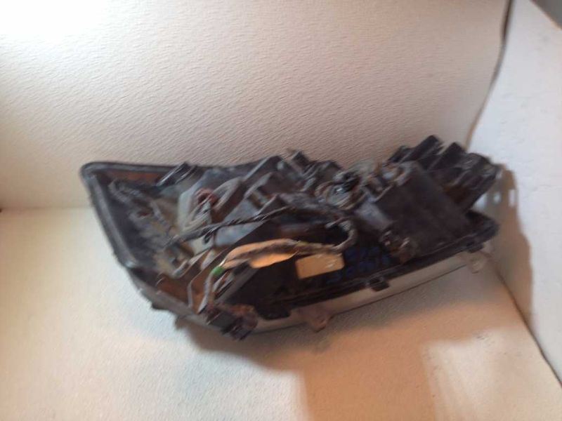 Left headlamp assembly composite used genuine OEM Nissan Armada 2005-2007