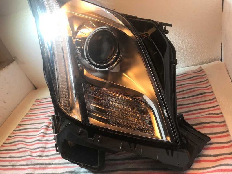 Headlamp Assembly used genuine OEM Cadillac XTS 2013-2017