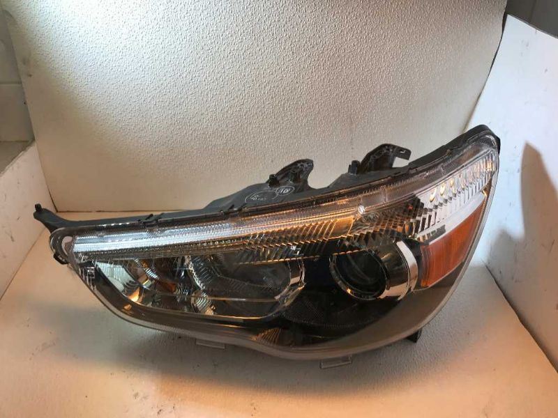 Headlamp Assembly used genuine OEM Mitsubishi RVR 2011-2019