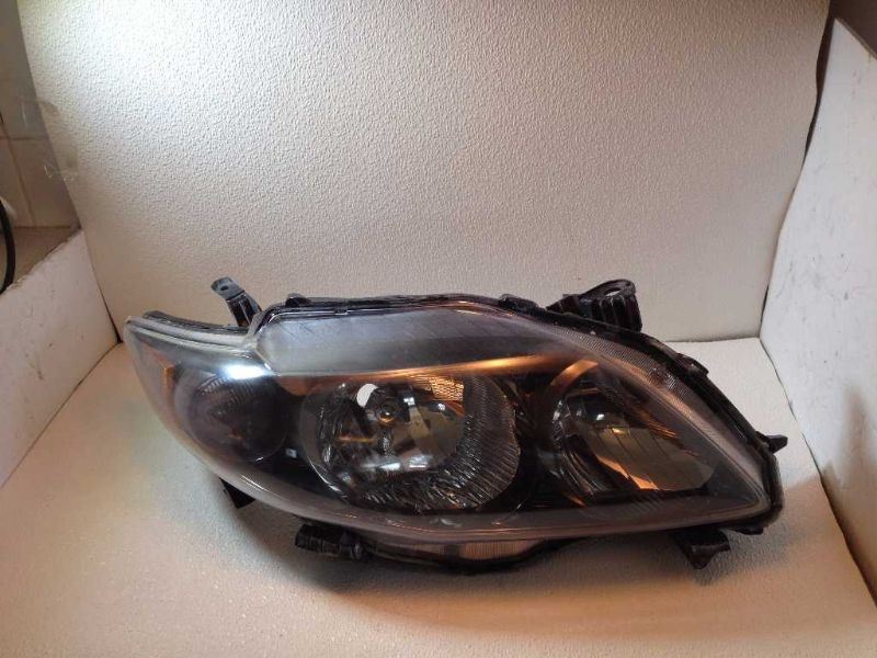 Right headlamp assembly composite used genuine OEM Toyota Corolla 2009-2010