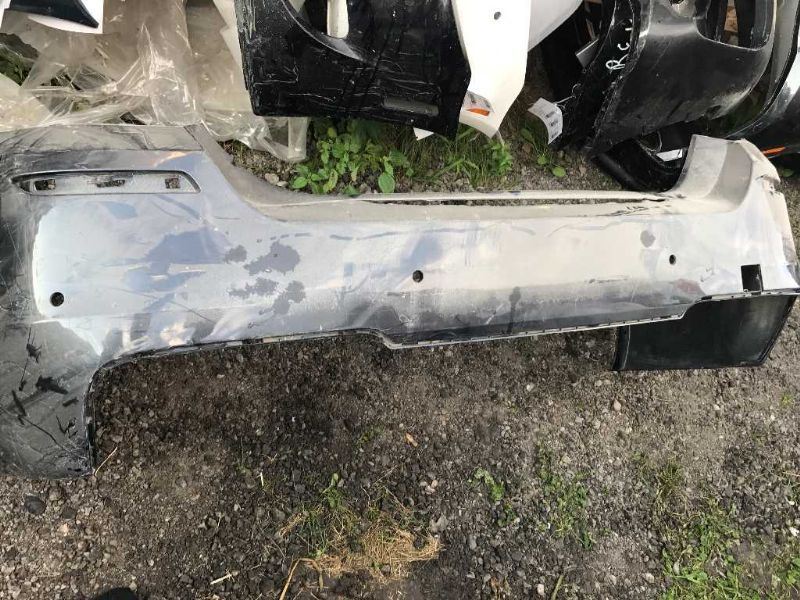 Rear bumper cover used genuine OEM BMW 528I 2011-2016
