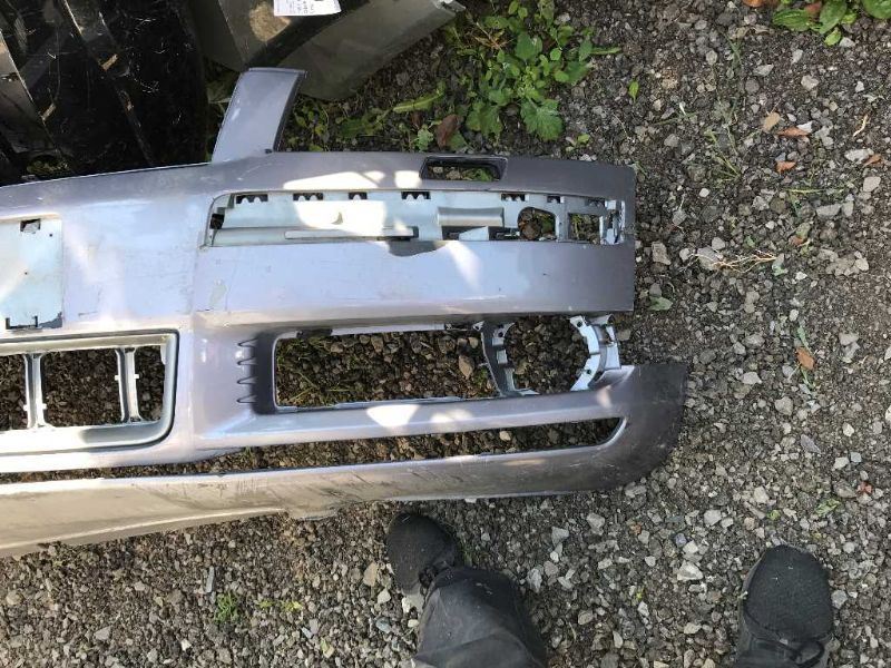 Front bumper cover used genuine OEM