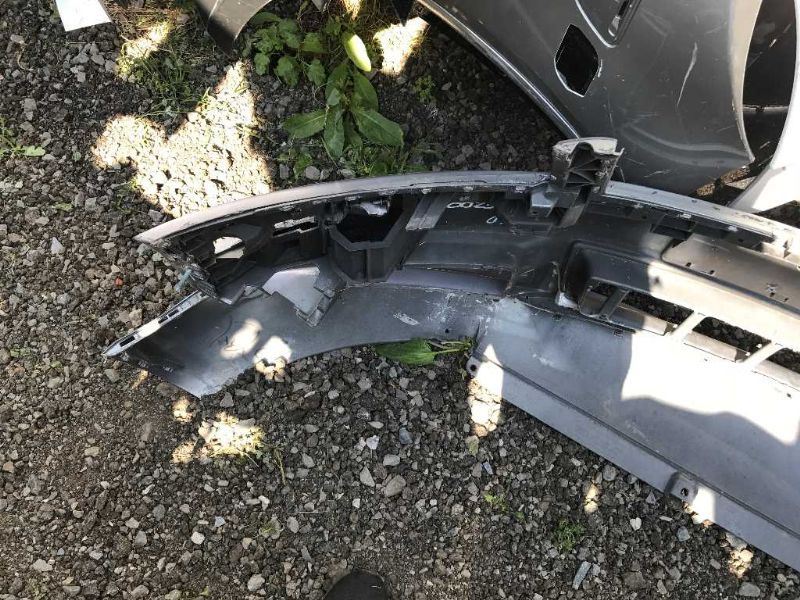 Front bumper cover used genuine OEM